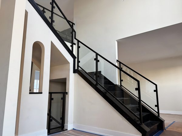 Glass railing for interior stairs