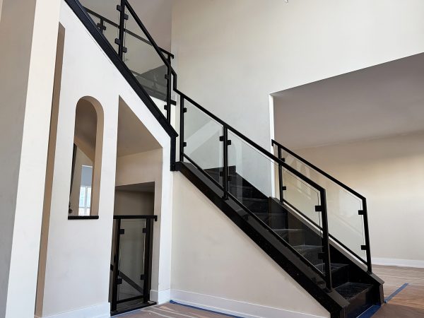 Glass railing for interior stairs
