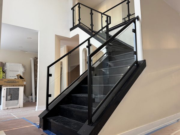 Interior glass and metal frame railing