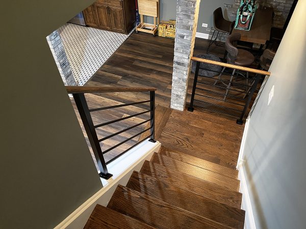 Basement railings with horizontal rods and oak cap