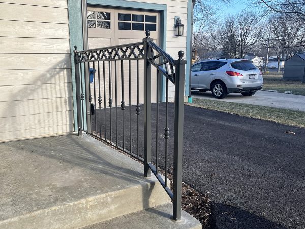 Porch railing with decorative elements | Railings Near Me