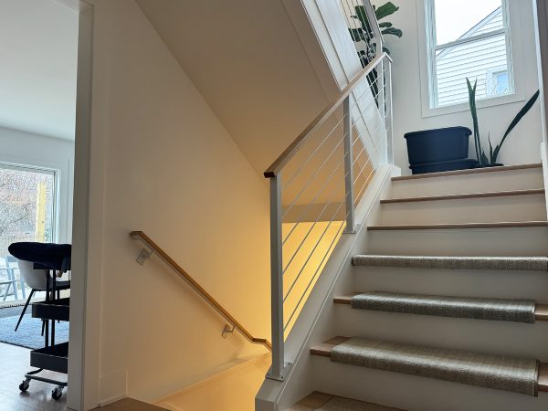 Interior horizontal white railings with slim bar design