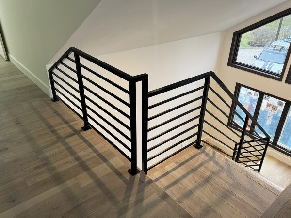 Horizontal custom railings for interior staircase