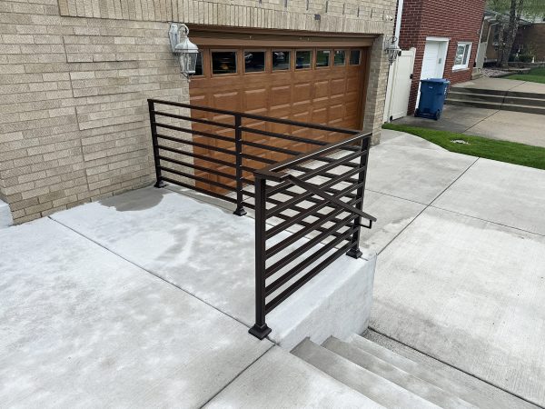 Brown horizontal railing with handrail