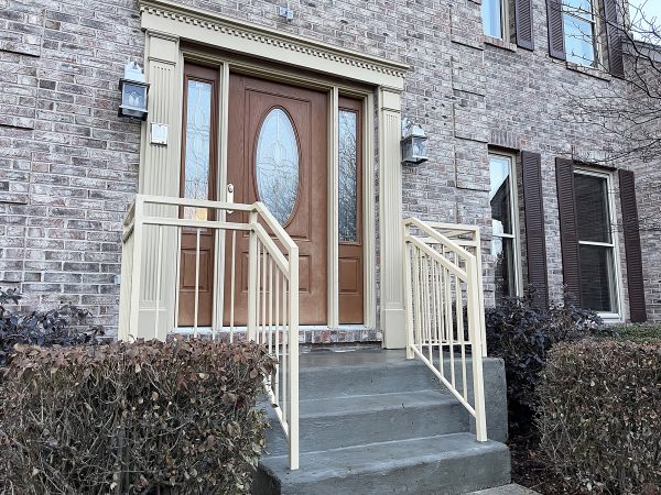 Exterior custom railing with double top painted beige