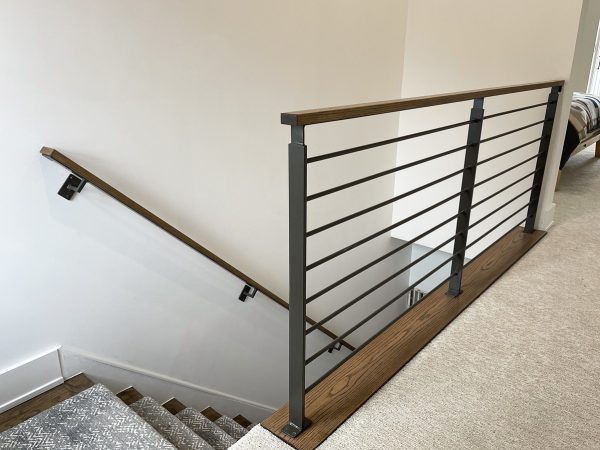 Interior horizontal railing with flat plate posts and wood cap | Best Chicago Railings