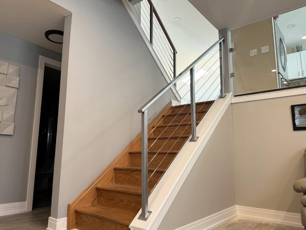 Cable railing with metal frame painted silver