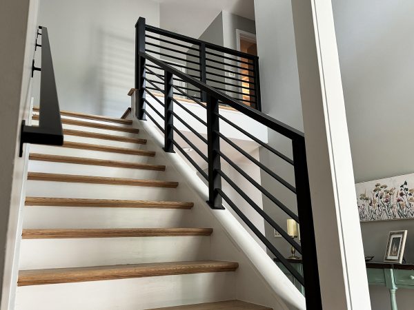 Interior railings with thick posts and horizontal flat plates