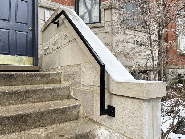 Round handrails with custom brackets