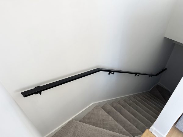 Interior handrail with custom brackets