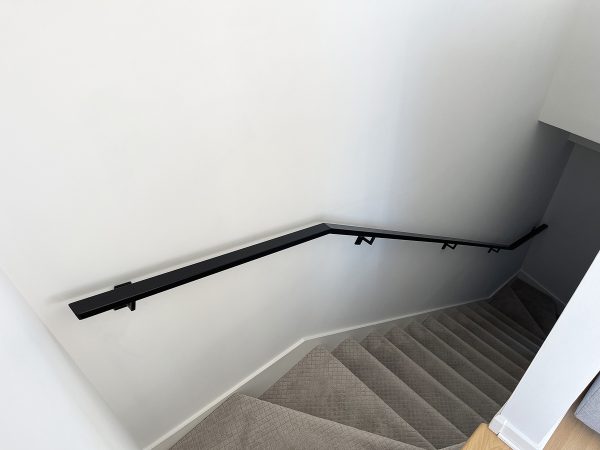 Interior handrail with custom brackets