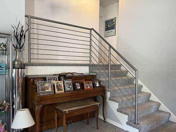 Interior horizontal round pipe railing
