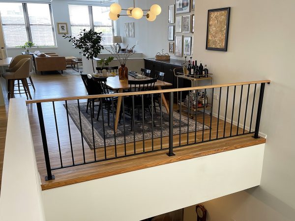 Balcony railing with a wood top