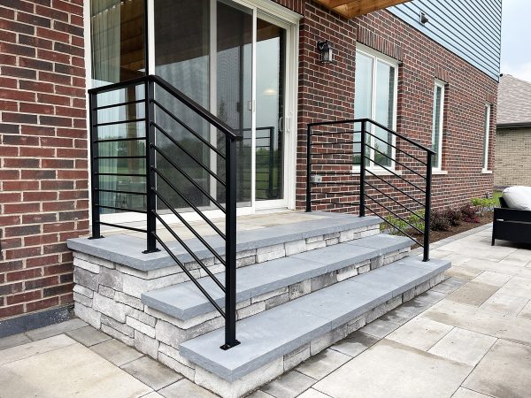Exterior horizontal railings with bottom flanges