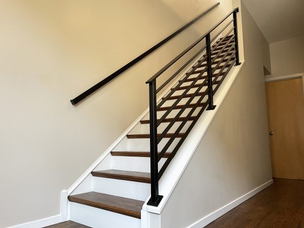 Interior custom railing with flat rods
