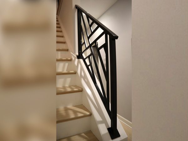 Decorative geometric railing for basement | Best Chicago Railings
